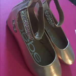 Bebe gold flats